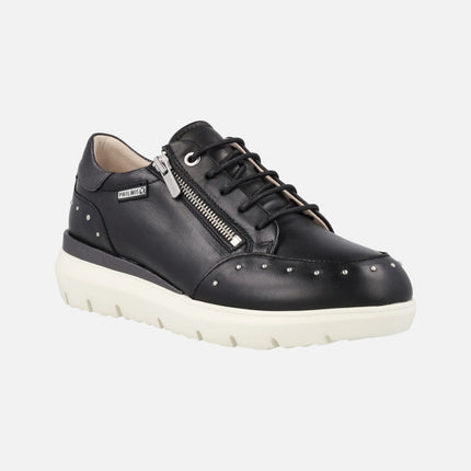 Black leather sneakers with studs and zip