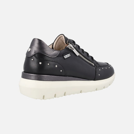 Black leather sneakers with studs and zip