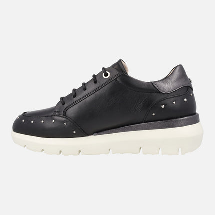 Black leather sneakers with studs and zip