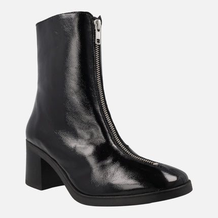 Heeled boots in black patent leather with front zipper