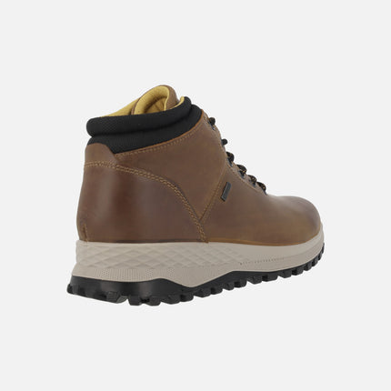 Sport style men's boots in brown greased leather with gore-tex