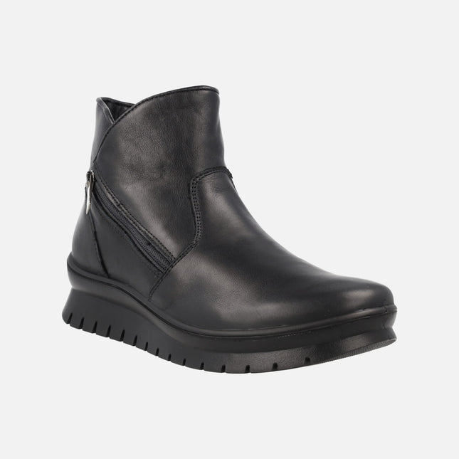 Black leather ankle boots with side zip and waterproof membrane