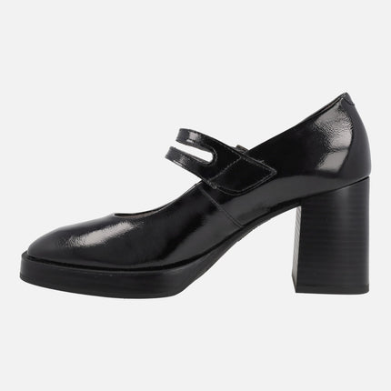 High heeled black patent leather Mary Jane style shoes