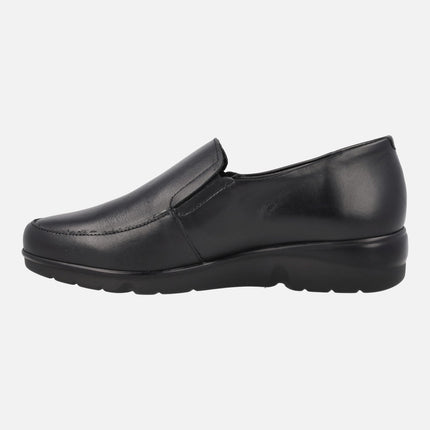 Black leather moccasins with lateral elastics