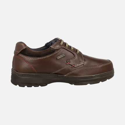 Brown leather shoes with laces and waterproof membrane