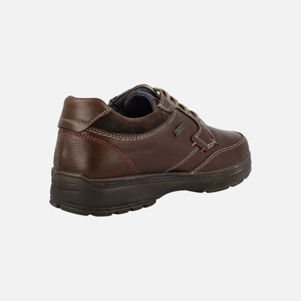 Brown leather shoes with laces and waterproof membrane