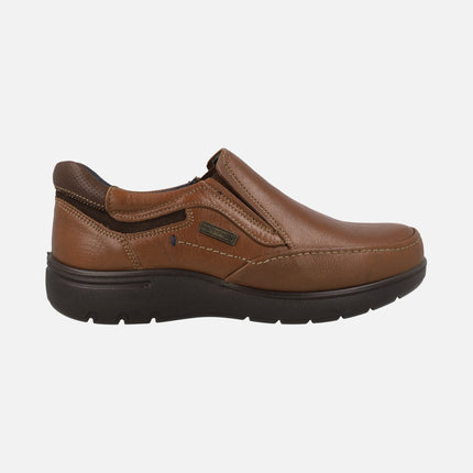 Leather moccasins with side elastics and waterproof membrane