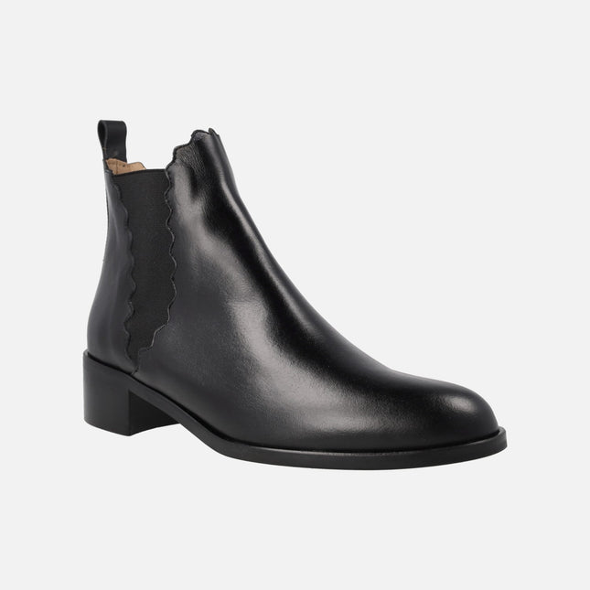 Black leather Chelsea style boots