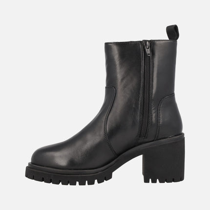 Black leather heeled booties with side zippers