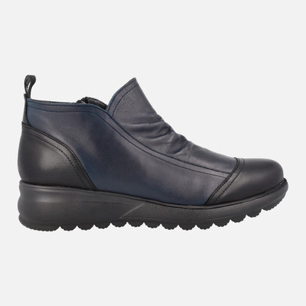 Low ankle boots in blue leather combined with Black