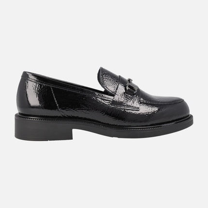 Black patent leather moccasins with metallic ornament