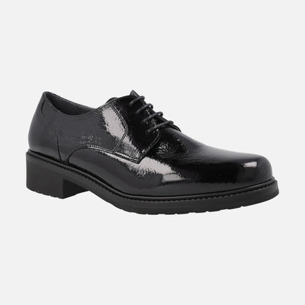 Black patent leather laced shoes