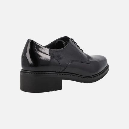 Black patent leather laced shoes