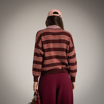 Striped sweater with polo neck in pink combination
