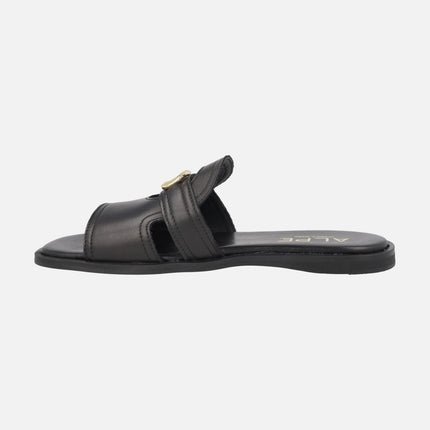 Sandalias planas estilo pala Sheila en piel negra con adorno oro