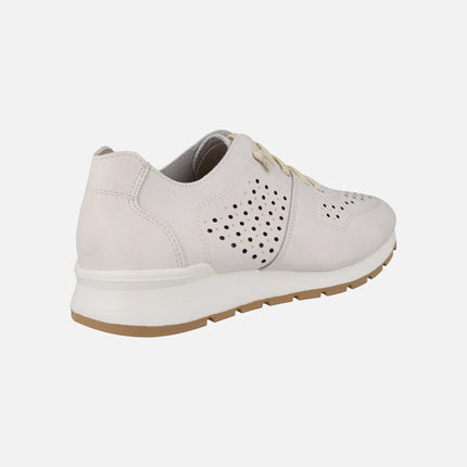 Sneakers with perforations and elastic cords