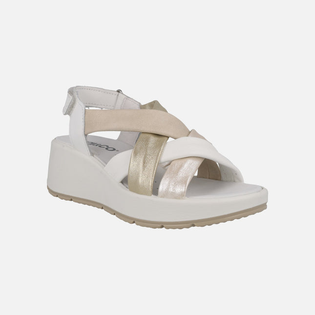 Leather sandals with combined strips and velcro closure