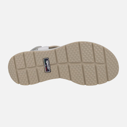 Leather sandals with combined strips and velcro closure