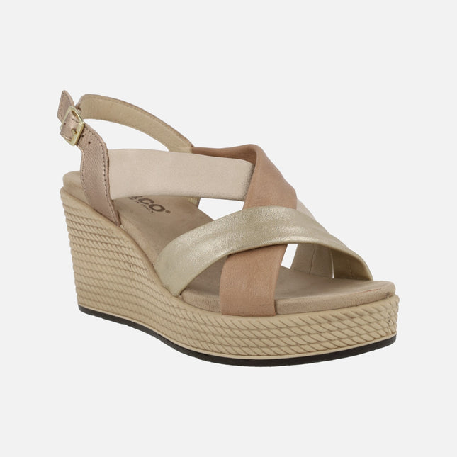 Stripped sandals with high wedge and buckle closure