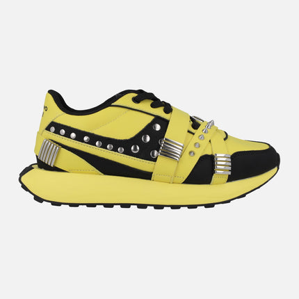 Yellow leather sneakers with studs and spikes UMA by María Escoté