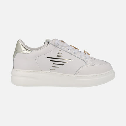 White leather sneakers with golden ornaments