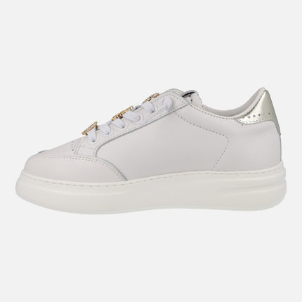 White leather sneakers with golden ornaments