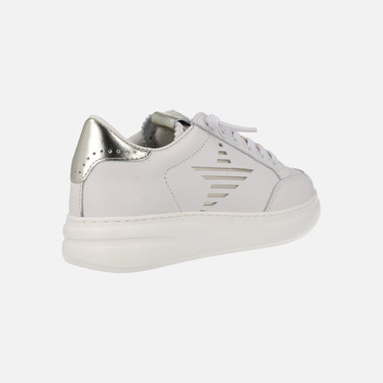 White leather sneakers with golden ornaments