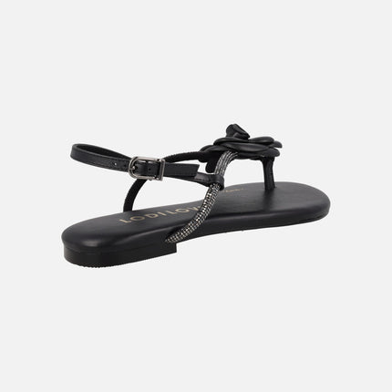 Black leather flat sandals with flower ornament