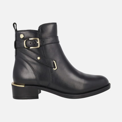 Black leather ankle boots with golden metal details