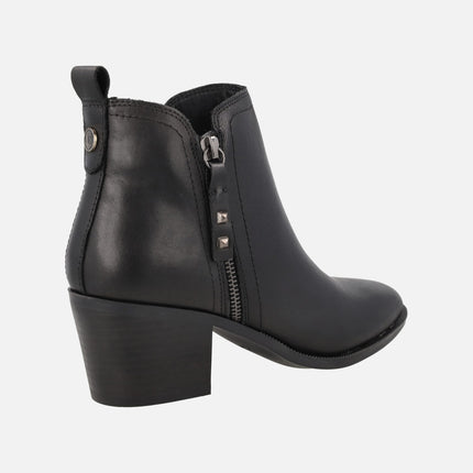 Botines de tacón en piel negra con doble cremallera