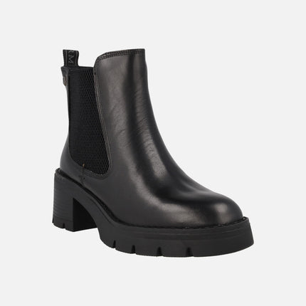 Black leather boots with elastic and zipper