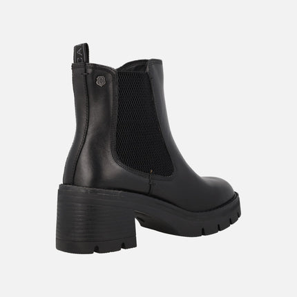 Black leather boots with elastic and zipper
