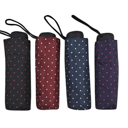 Folding umbrella with dots