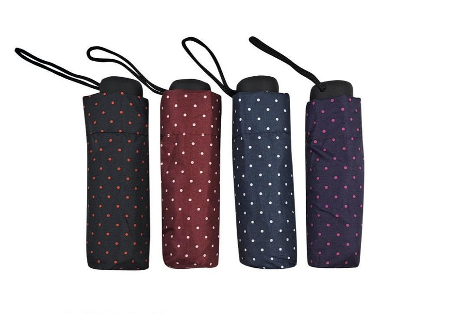 Folding umbrella with dots