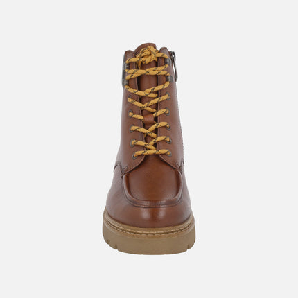 Botines de piel con cordones y forro de pelo