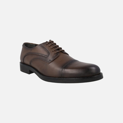 Zapatos de piel para hombre con puntera pespunteada
