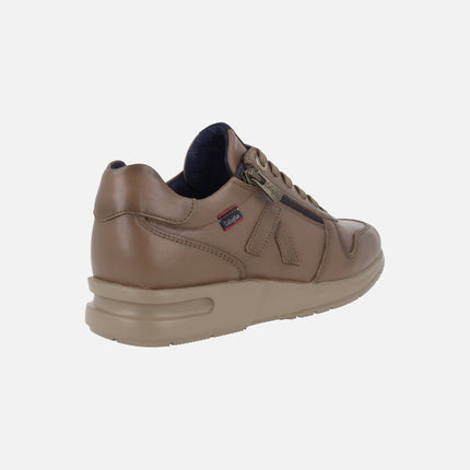 Zapatos deportivos de piel marrón con cordones y cremallera