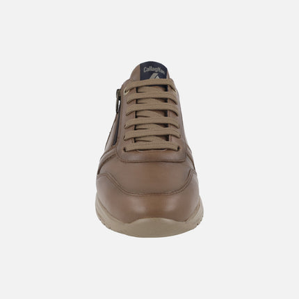 Zapatos deportivos de piel marrón con cordones y cremallera