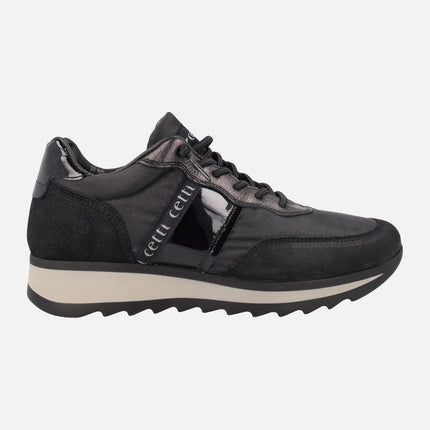 Zapatillas deportivas de piel y tejido en combinado negro