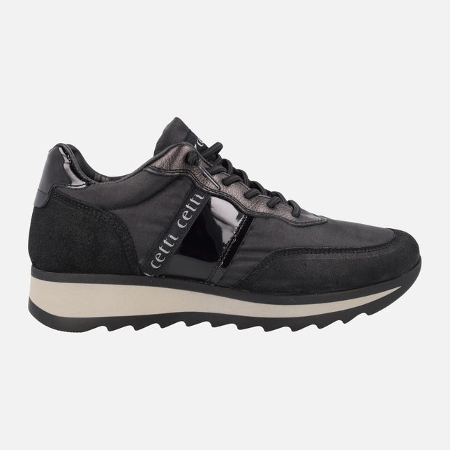 Zapatillas deportivas de piel y tejido en combinado negro