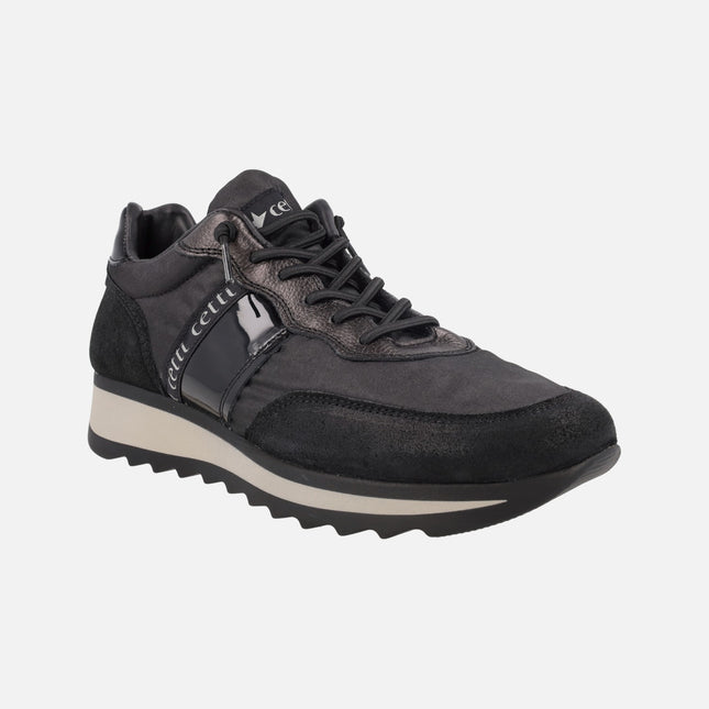 Zapatillas deportivas de piel y tejido en combinado negro