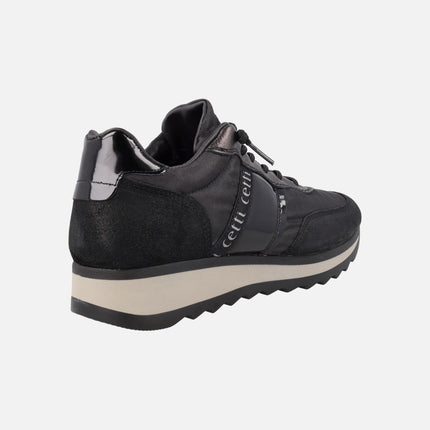 Zapatillas deportivas de piel y tejido en combinado negro