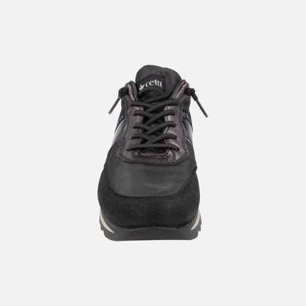 Zapatillas deportivas de piel y tejido en combinado negro