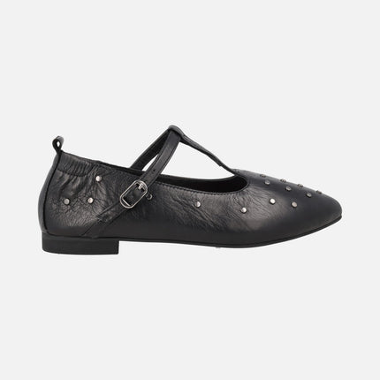 Black leather flats with t -shaped strips and metallic studs