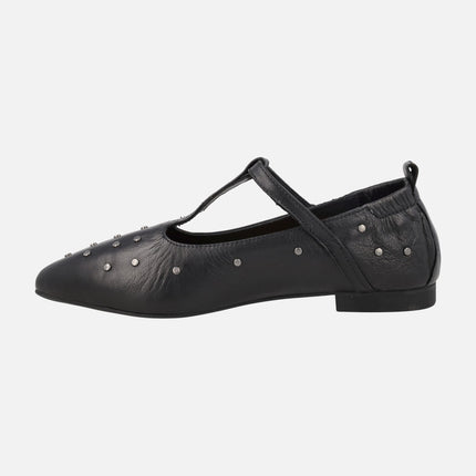 Black leather flats with t -shaped strips and metallic studs