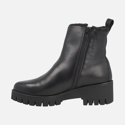 Leather ankle boots with furry lining and middle wedge