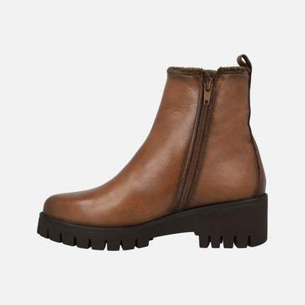 Leather ankle boots with furry lining and middle wedge