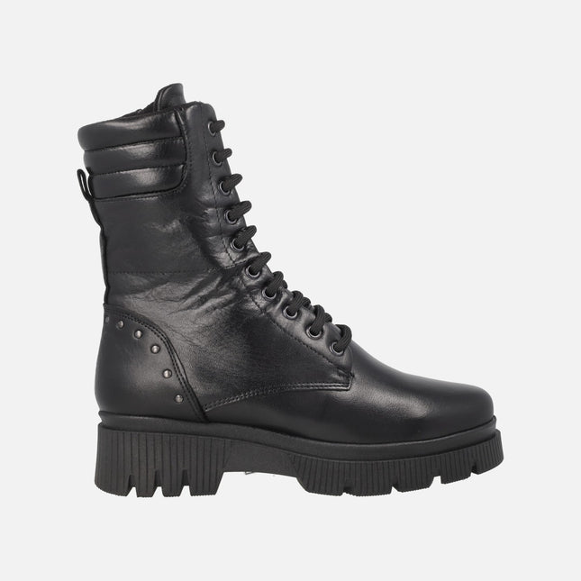 Botines negros de piel con caña alta y cuello acolchado