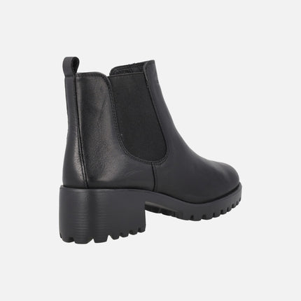 Botines confort en piel negra con elástico y piso track