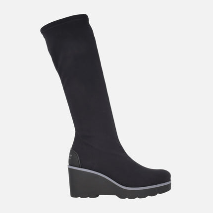 Botas altas de tejido elástico negro con cuña alta